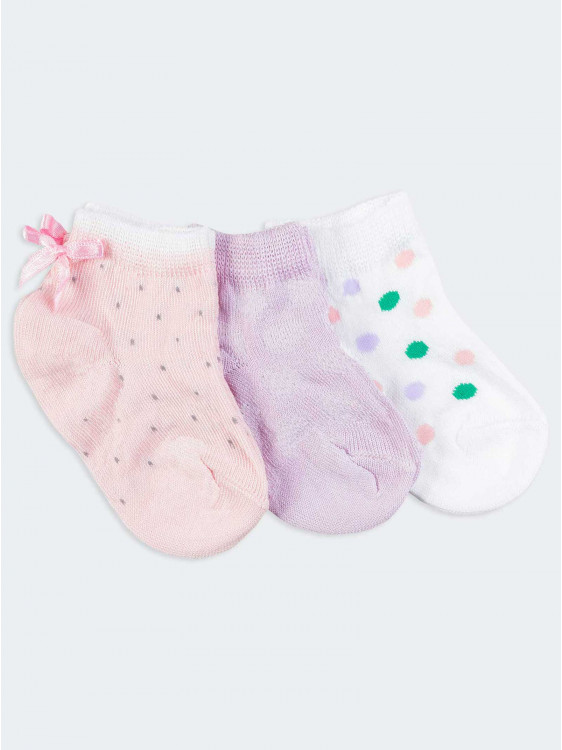 Kurze Socken für Neugeborene mit Schleife im Tupfenmuster