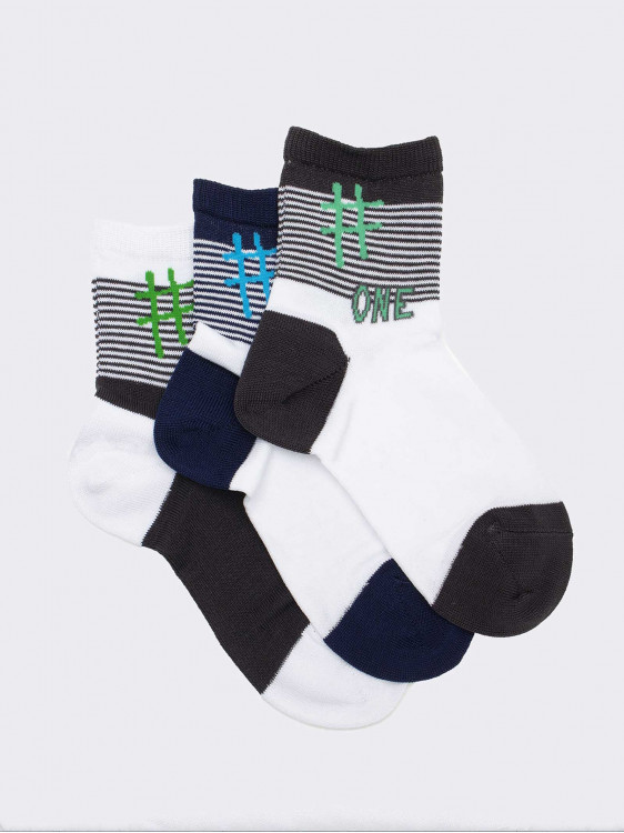 Three patterned children's crew socks One in cool Cotton