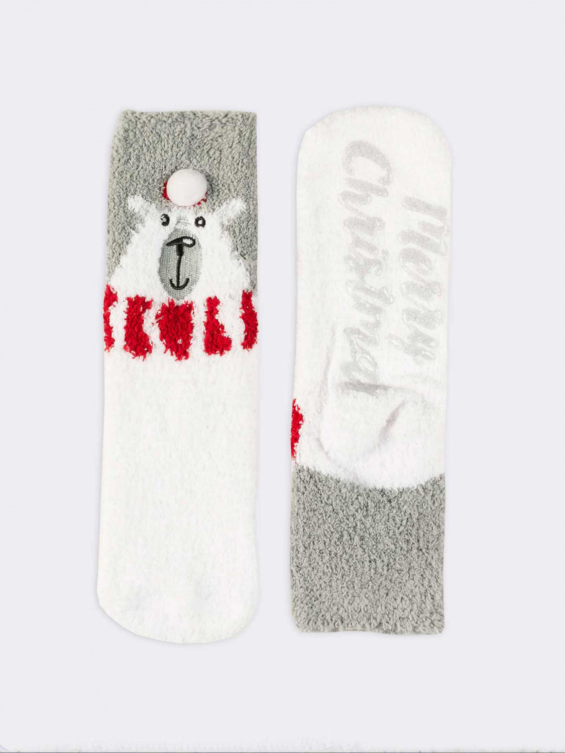 Pair of Christmas socks with snowflakes and Polar Bear patterns