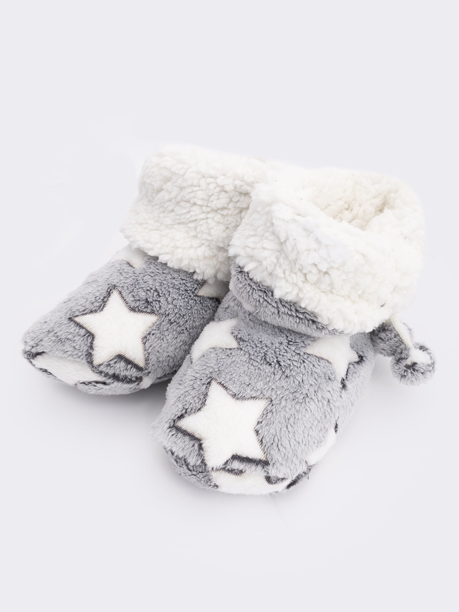 Two pairs of star patterned women's slippers with warm inside