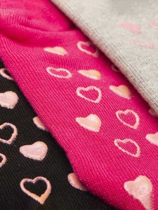 Trio of girl's non-slip socks with heart pattern