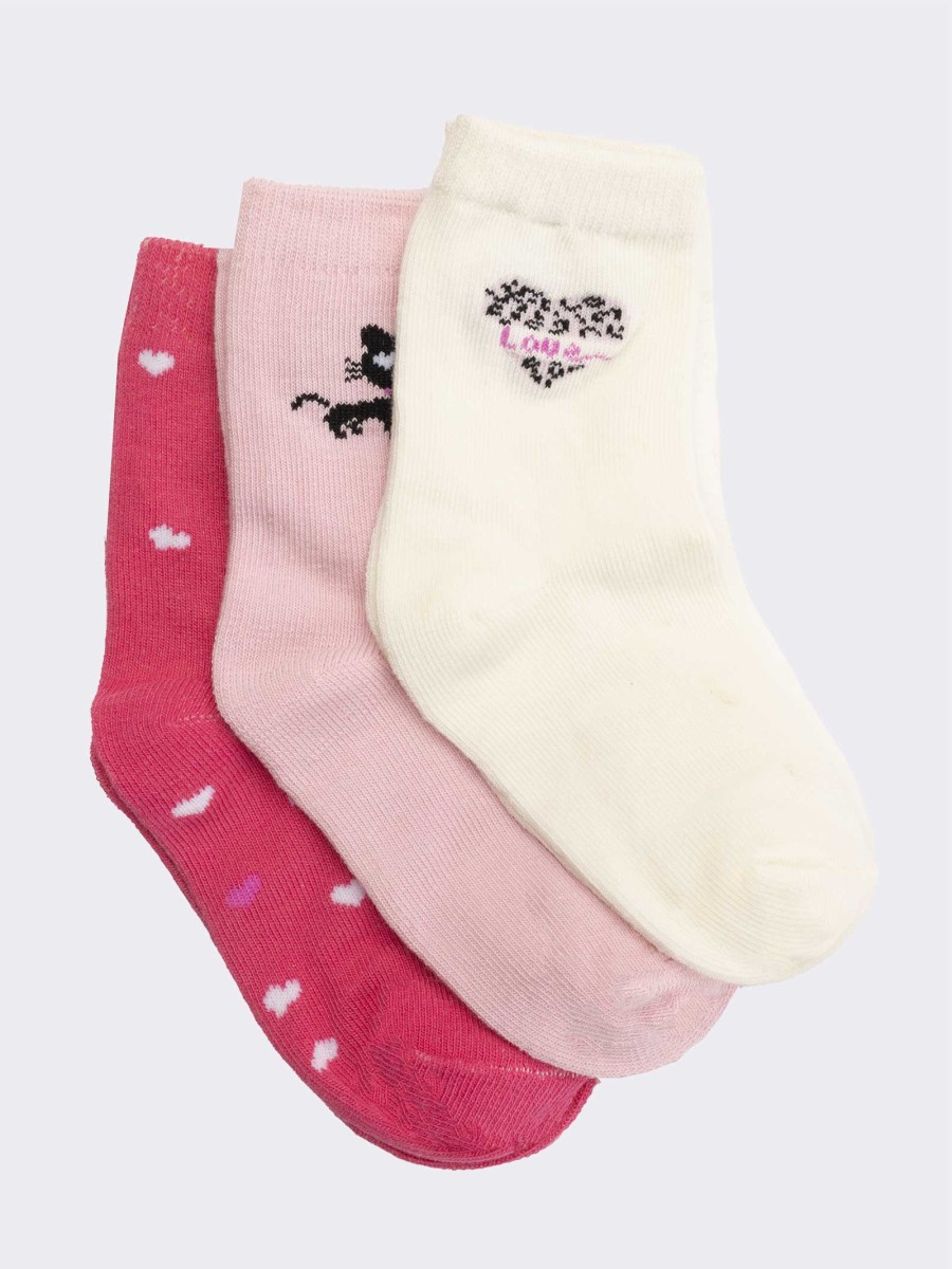 Three patterned baby socks in 'hearts' gift bag